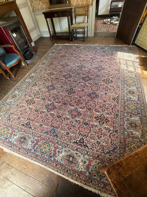 an image of a large oriental rug in a living room