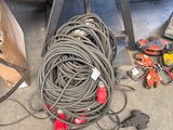 a lot of wires and tools on the ground