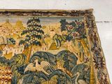 a tapestry with a picture of a woman and a cat