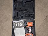 a black case with tools inside of it on the floor