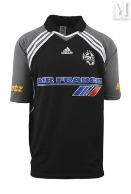 a black shirt with a blue and white logo on the chest
