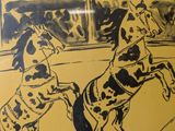 a picture of a picture of two horses in a circus