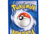 a close up of a card with a pokemon ball on it