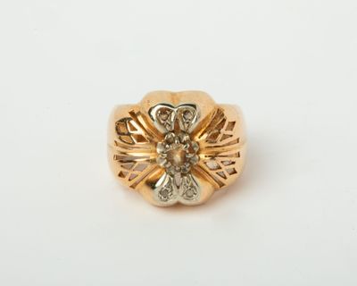 a close up of a gold ring with diamonds on a white background
