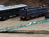 a lot of toy trains that are lined up together