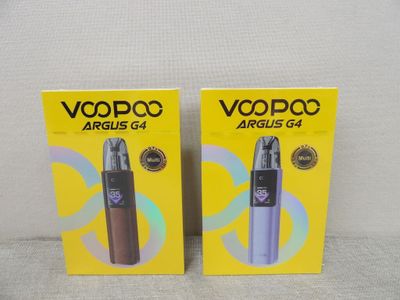 deux boîtes de Vaporos posées sur une surface blanche avec un fond jaune