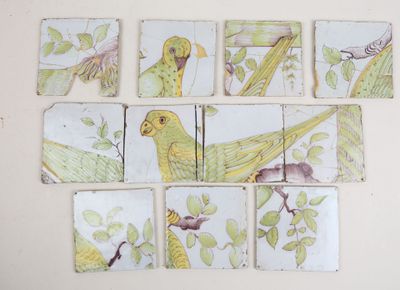 a picture of a picture of birds and leaves on the wall