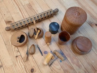 a wooden table with a lot of different items on it