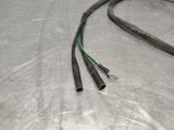 two wires that are connected to a wire on the table
