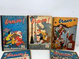 four children ' s books are lined up on a white surface