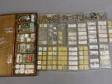 a wooden box filled with assorted items on top of a table