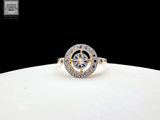 an image of a diamond ring on a white plate