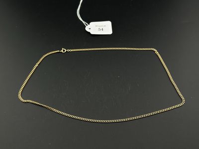 a gold chain with a tag attached to it