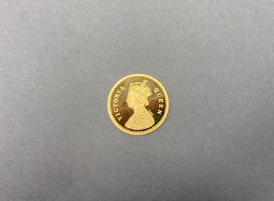 une pièce d'or portant un visage de femme
