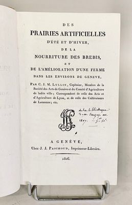 an open book with a picture of a bird on it