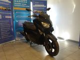 a motorcycle that is parked in a showroom