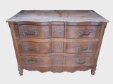 une photo d'une commode en bois avec un plateau en marbre et des tiroirs