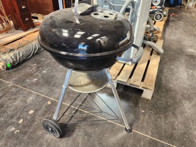 an image of a barbecue grill in a garage