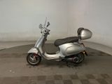 a scooter that is parked inside of a building