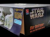 the box is open to show the star wars action figure
