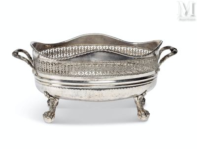 an antique silver plate with handles and handles on a stand