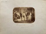 an old photo of a group of people posing for a picture