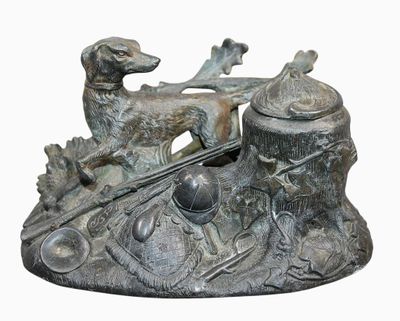a statue of a dog on a boat with a dog on it