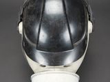 a close up of a gas mask on a table