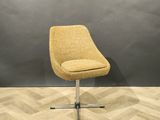 an image of a yellow chair sitting on top of a hard wood floor
