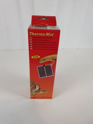 une boîte de tapis thermo sur une surface blanche