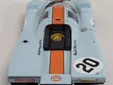 a model of a racing car on a white surface