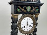 a clock that is sitting on top of a table