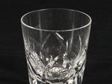 an empty glass on a black background with a black background