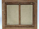 an old picture frame with a picture of a window in it