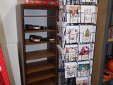 a lot of christmas cards on the shelves in the room