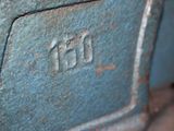 a close up of a metal object with the word hh written on it