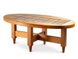 an image of a wooden table with a tile top on a white background