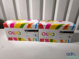 the two boxes are sitting next to each other on the table