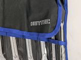 six wrenches in the pouch of a tool bag