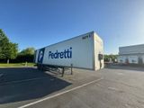 a semi truck that is parked in a parking lot