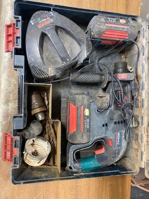 a tool box with tools in it sitting on a table