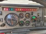 a dashboard of a car with various gauges and numbers