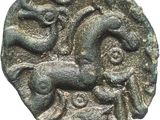 a close up of a coin with a horse on it