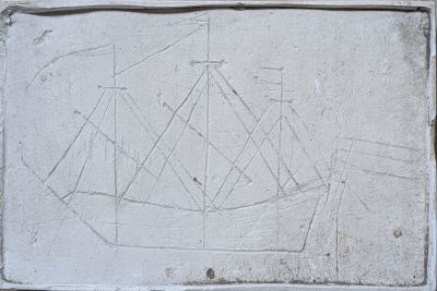 a drawing of a sailboat on a cement block