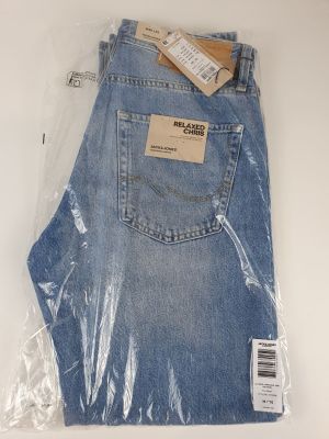 the back of a pair of blue jeans wrapped in plastic