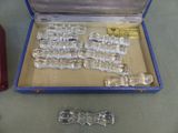 a box that has a bunch of glass pieces in it