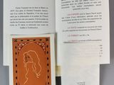 an open book with a picture of a woman ' s face on it