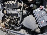 a car engine that has been turned on and is sitting on the ground