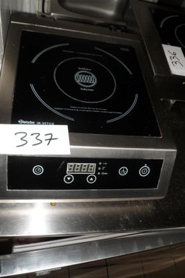 an image of a stove with a sign on it