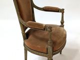 an image of a chair with a brown leather seat on a white background